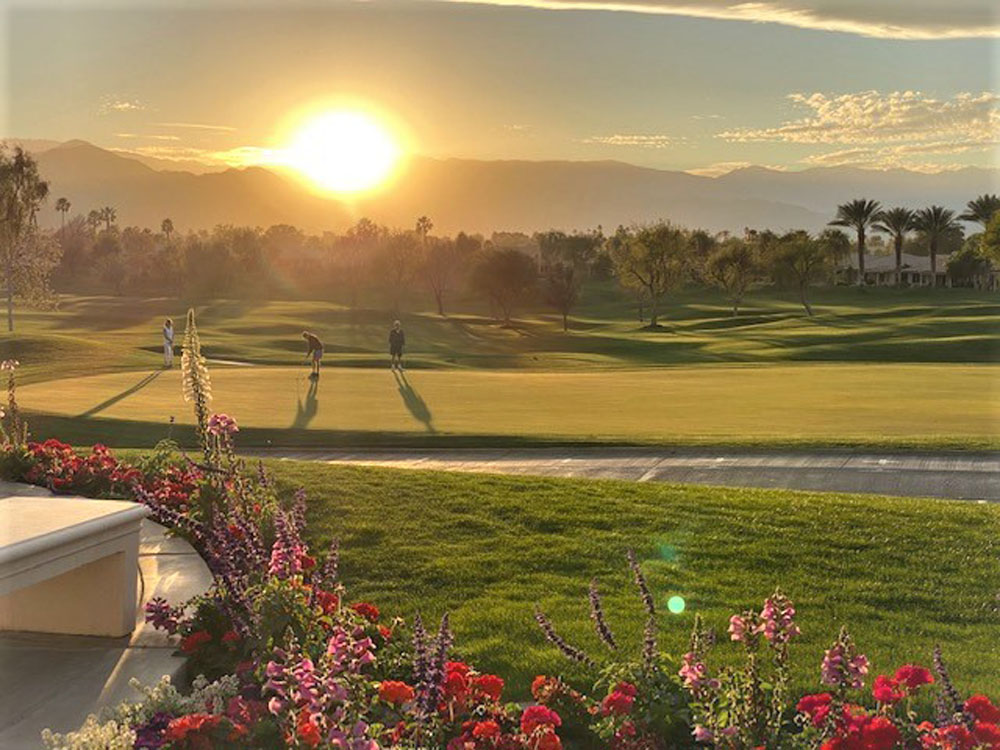 Golf - Golfers at sunset